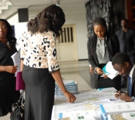 Participants at the registration desk - iQube 2012