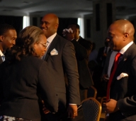Mrs Ibukun Awosika exchanging pleasantries with other speakers after her presentation